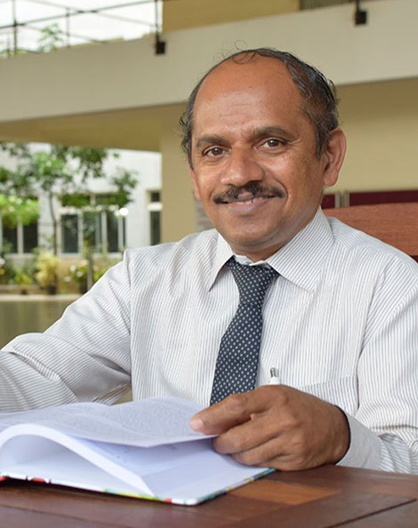 Dr. Rathnakar Achary
